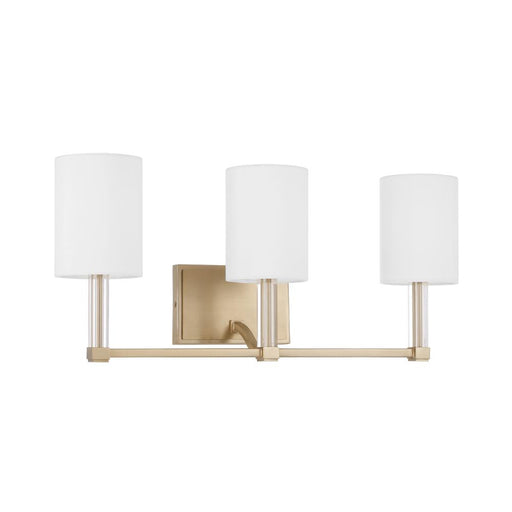 Capital 3-Light Vanity in Matte Brass with Clear Acrylic Accents and Cylindrical White Fabric Shades