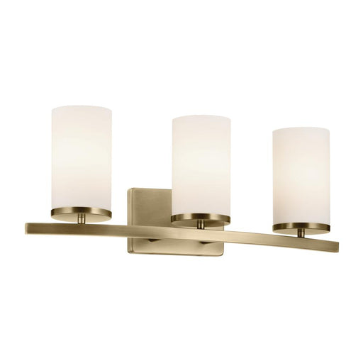 Kichler Crosby 23" 3-Light Vanity Light with Satin Etched Cased Opal Glass in Natural Brass