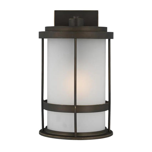 Generation Lighting Wilburn modern 1-light LED outdoor exterior medium wall lantern sconce in antique bronze finish with