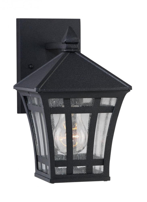 Generation Lighting Herrington transitional 1-light outdoor exterior small wall lantern sconce in black finish with clea